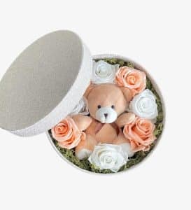 Caixa de Flores preservadas em urso
