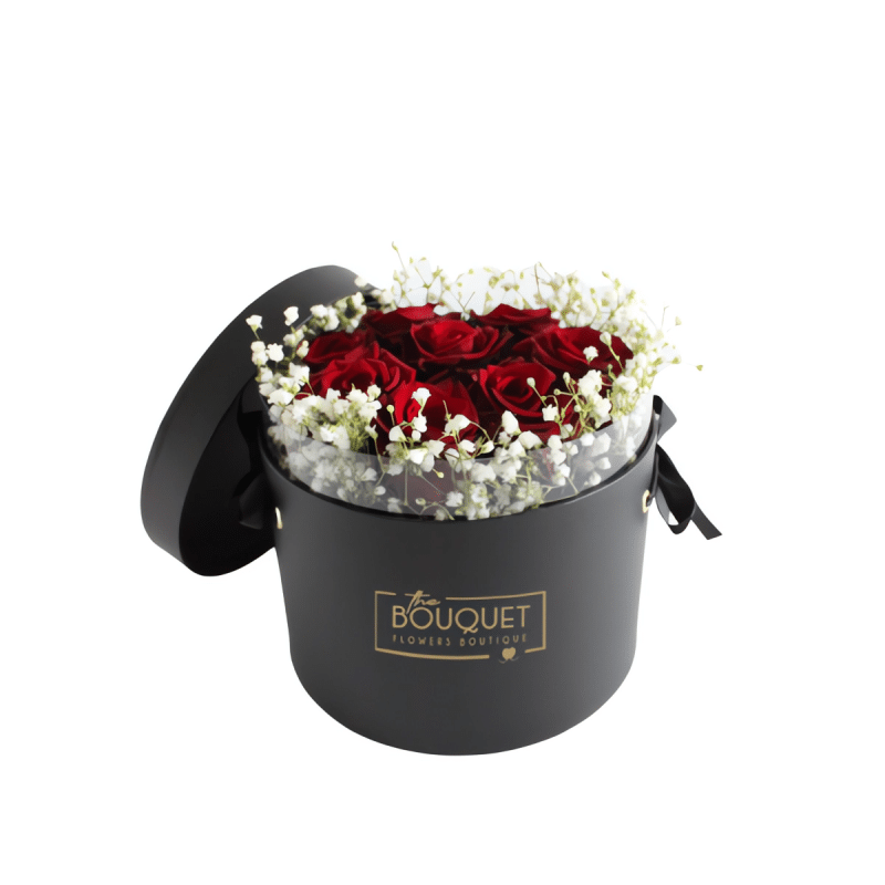 Arranjo de rosas vermelhas em caixa